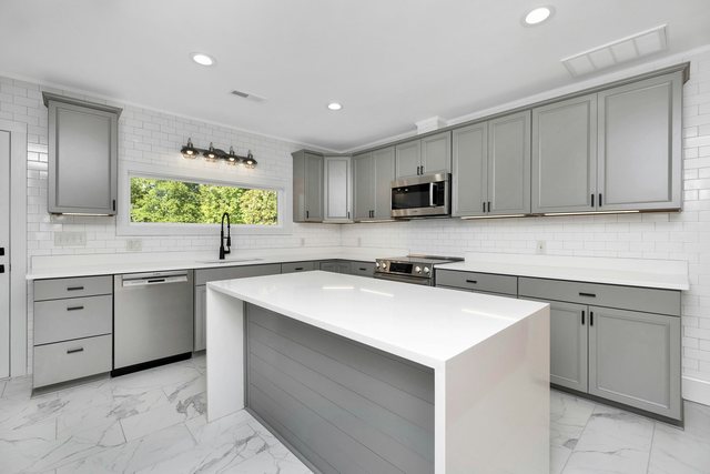 Kitchens, media walls and bathroom cabinetry we build to reference