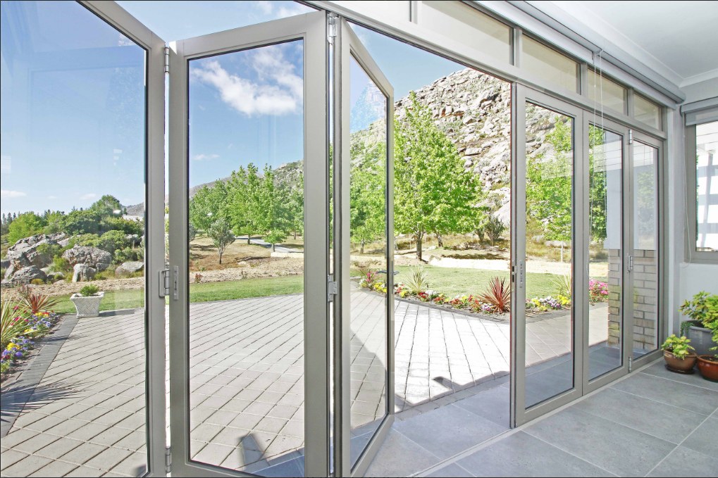 Folding door systems