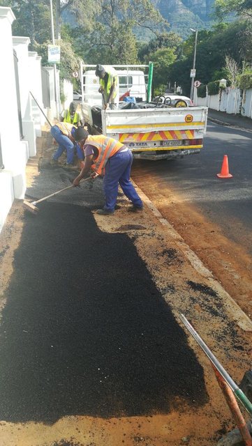 Tar surfacing and reinstatement